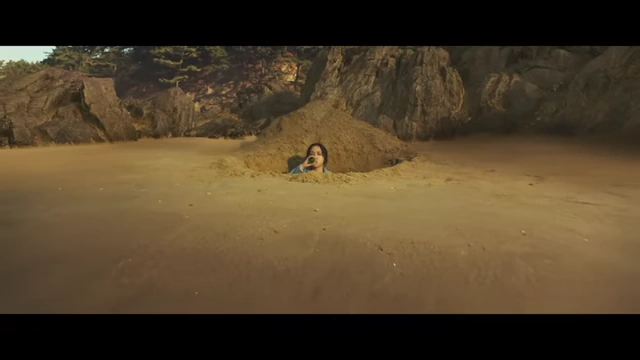 Seo-rae buried up to her neck in sand on the beach, an extreme act symbolizing her taking on Hae-jun's final problem.