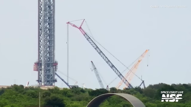 Two large cranes working on construction at Launch Complex 39A