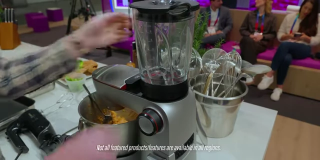 A Bosch kitchen mixer demonstrating its dual function as a blender with interchangeable attachments.