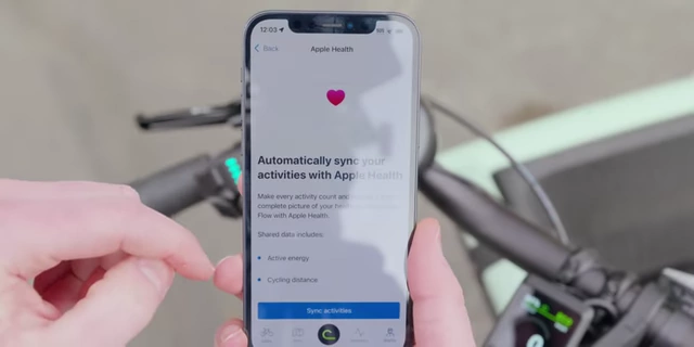 The Bosch eBike Flow app screen showing the option to automatically sync activities with Apple Health.