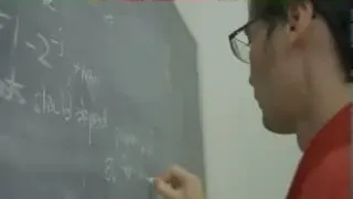 Terry Tao demonstrates the mathematical principles behind compressed sensing on a blackboard.