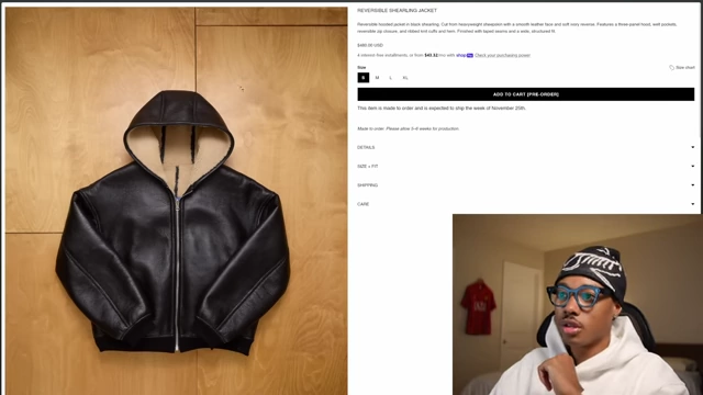 A black leather hooded jacket with a shearling lining, representing a desired "trucker style" leather jacket