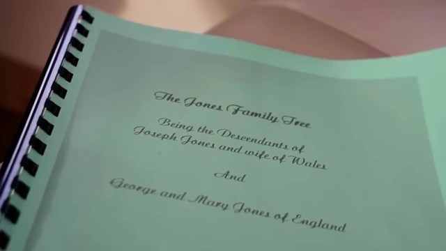 A binder titled "The Jones Family Tree" is shown, representing the grandmother's extensive genealogical work.