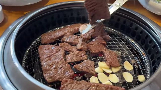 Korean BBQ meat cooking on the grill