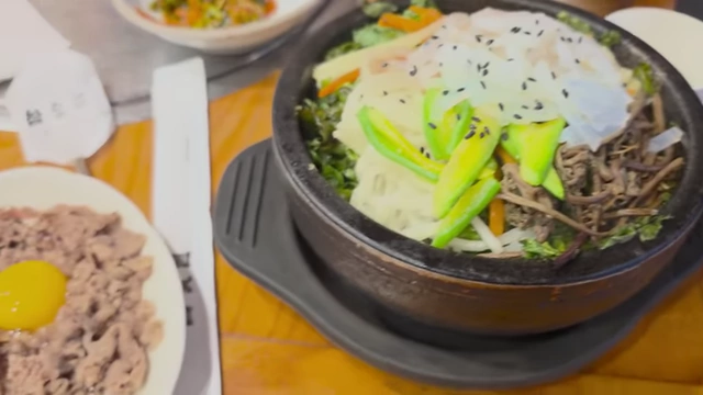 Dolsot bibimbap with vegetables and meat