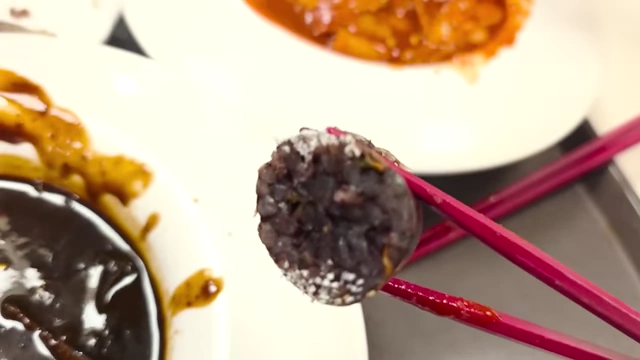 Sundae (Korean blood sausage) with chopsticks