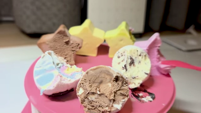 Close-up of the various ice cream flavors in the sampler cake
