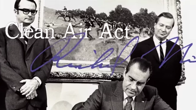 President Richard Nixon signing the Clean Air Act, a landmark environmental legislation.