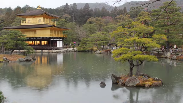 The Golden Pavilion (Kinkakuji) reflected in a pond.