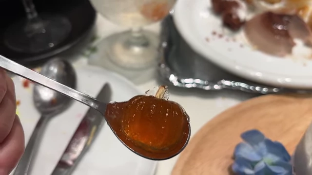A spoonful of the rubbery, inedible pumpkin jelly from the "Magic of Levitating Objects" drink.