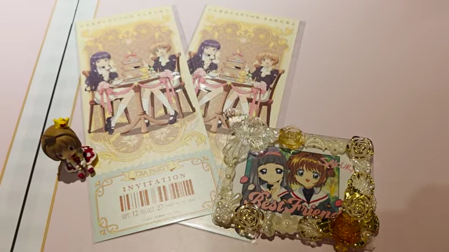 Two paper tea party invitation tickets featuring Cardcaptor Sakura promo art.