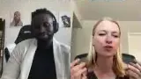 A blonde woman with a sleeveless top speaks, using hand gestures, while discussing how she chose her PhD program.