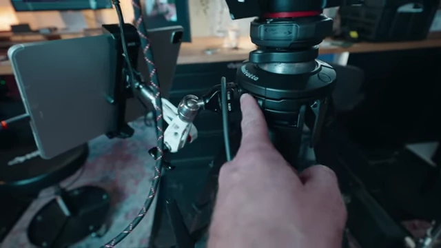1/4"-20 screw mount on the Manfrotto tripod for attaching accessories like the iPad