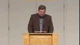 Pastor speaking from the pulpit about the heavy hearts many people are experiencing in 2020.