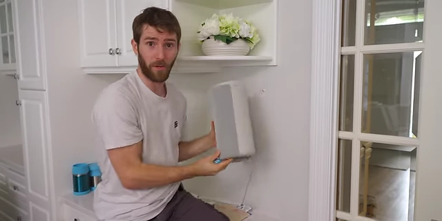 Linus demonstrates the lack of wired input on the Sony HT-A9 speaker
