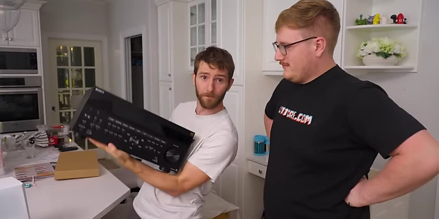 Linus holding the new Sony STR-AZ5000ES AV receiver