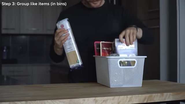 Grouping dried pasta into a white mesh bin