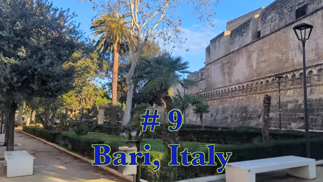 Bari, Italy with a fountain and old building in the background