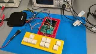 A high-end logic analyzer connected to the test jig setup, attempting to capture signals