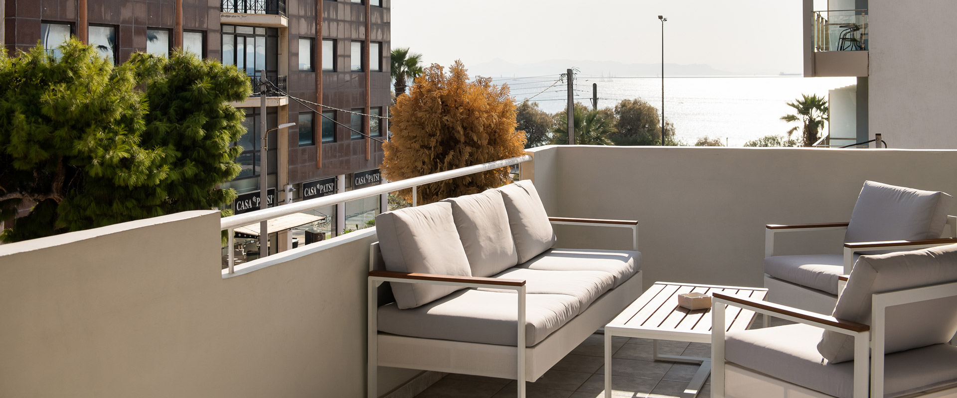 Sofa on the balcony of Alimos Flat