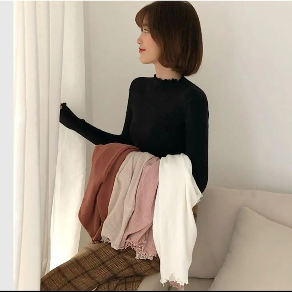 47. Daisy Curly Sweater