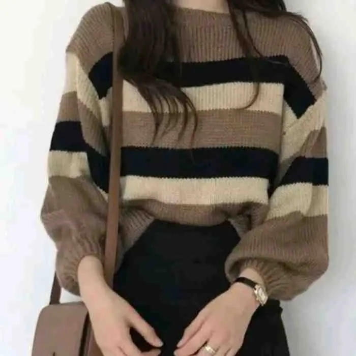 13. Donita Blouse Rajut