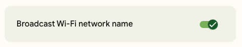 The "Broadcast Wi-Fi network name" tile within the GFiber portal, with a toggle switch.
