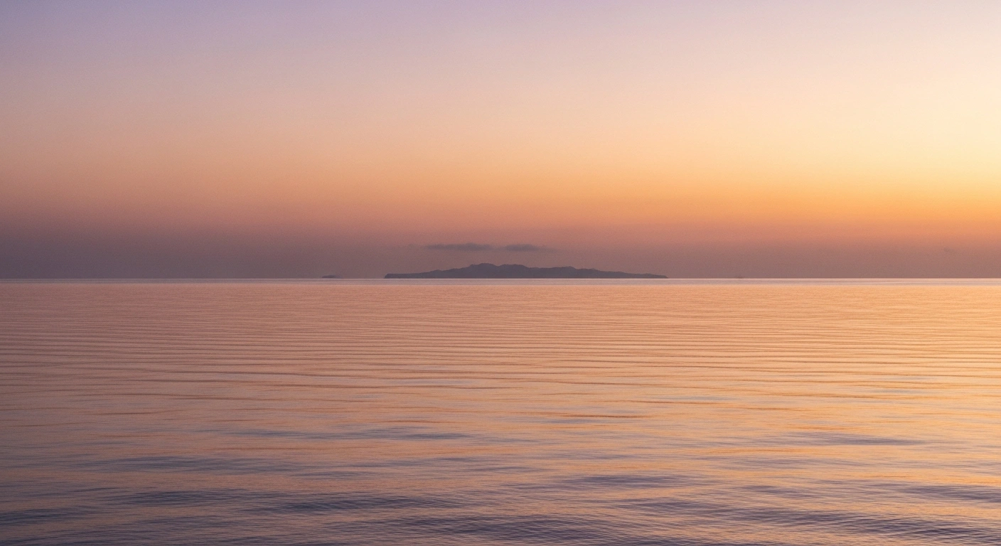 A serene dawn over the Mozambique Channel near Mayotte, with soft pastel skies reflecting on calm waters, representing the location of an unfelt magnitude 2.6 earthquake on January 30, 2026, at 06:03 am local time.