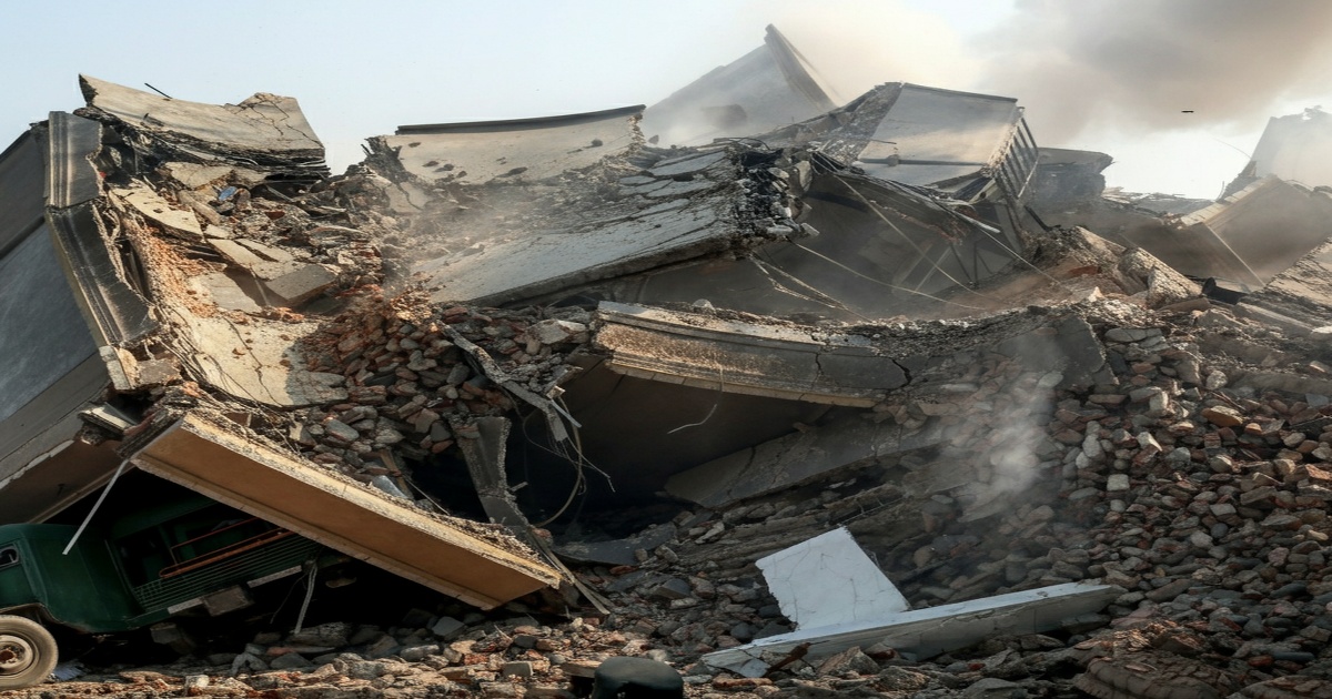 Main image to the post Building Collapse in Jhabua Claims One Life, Trapping Others