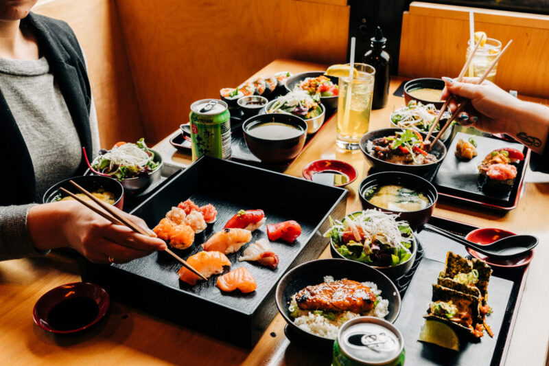 two guests enjoying Sushi-san express lunch