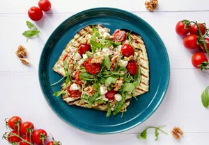 Grilled eggplant with spelt salad and cherry tomatoes