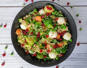 Quinoa salad with mozzarella and pomegranate seeds