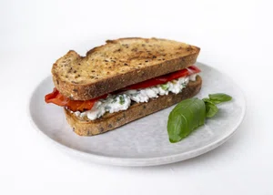 Sandwich with Mediterranean herb cheese and grilled pointed pepper