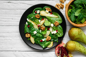 Feta-spinach salad with pear and pomegranate