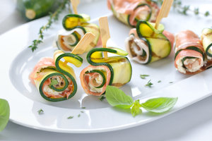 Zucchini rolls with prosciutto and crescenza