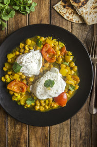 Indian chickpeas with poached eggs