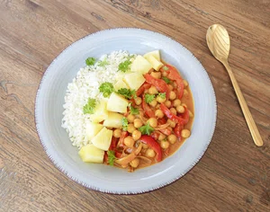 Red chickpea curry with cauliflower rice and pineapple