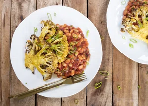 White beans with curried cauliflower steaks