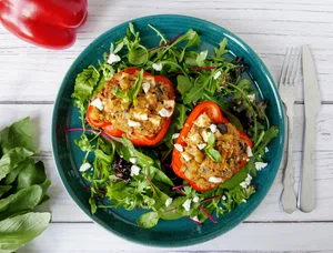 Stuffed bell peppers with salad