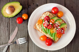 Hummus and avocado on toast