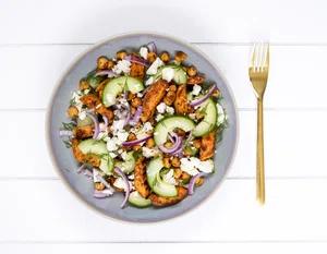 Spicy sweet potato salad with cucumber and feta