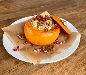 Stuffed pumpkin with fennel, pecans and pomegranate seeds