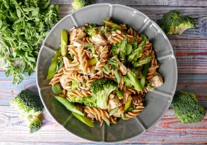 Pasta salad with chicken and green vegetables