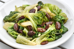 Pan-fried endive with olives and raisins