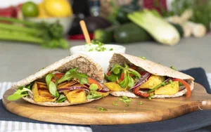 Pita with grilled pineapple and avocado lime sauce