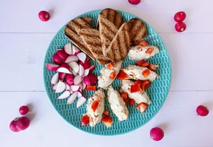 Egg and mackerel salad with radishes and toasted bread