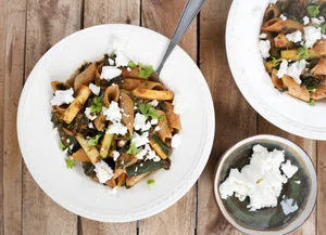 Penne with kale in red sauce and feta