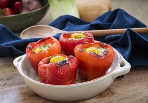 Oven-roasted peppers filled with quinoa and egg