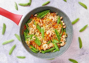 Noodles with sugar snap peas and prawns