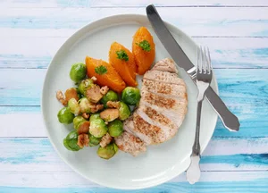 Pork chop with Brussels sprouts and mashed sweet potatoes